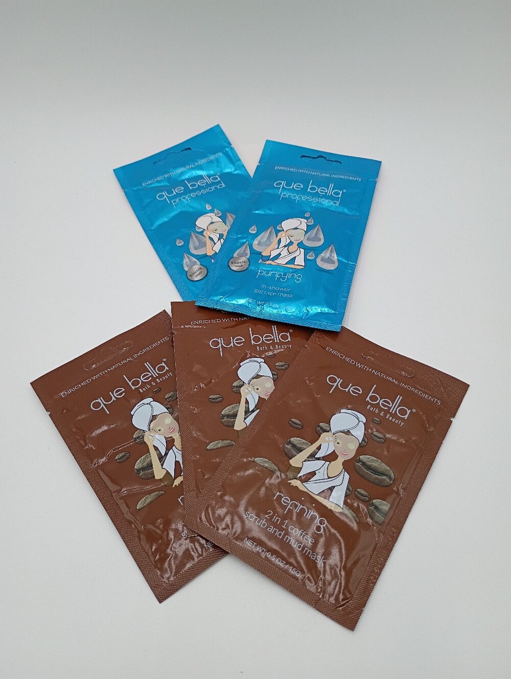 Que Bella face masks. Lot of 5. Two purifying, three refining.